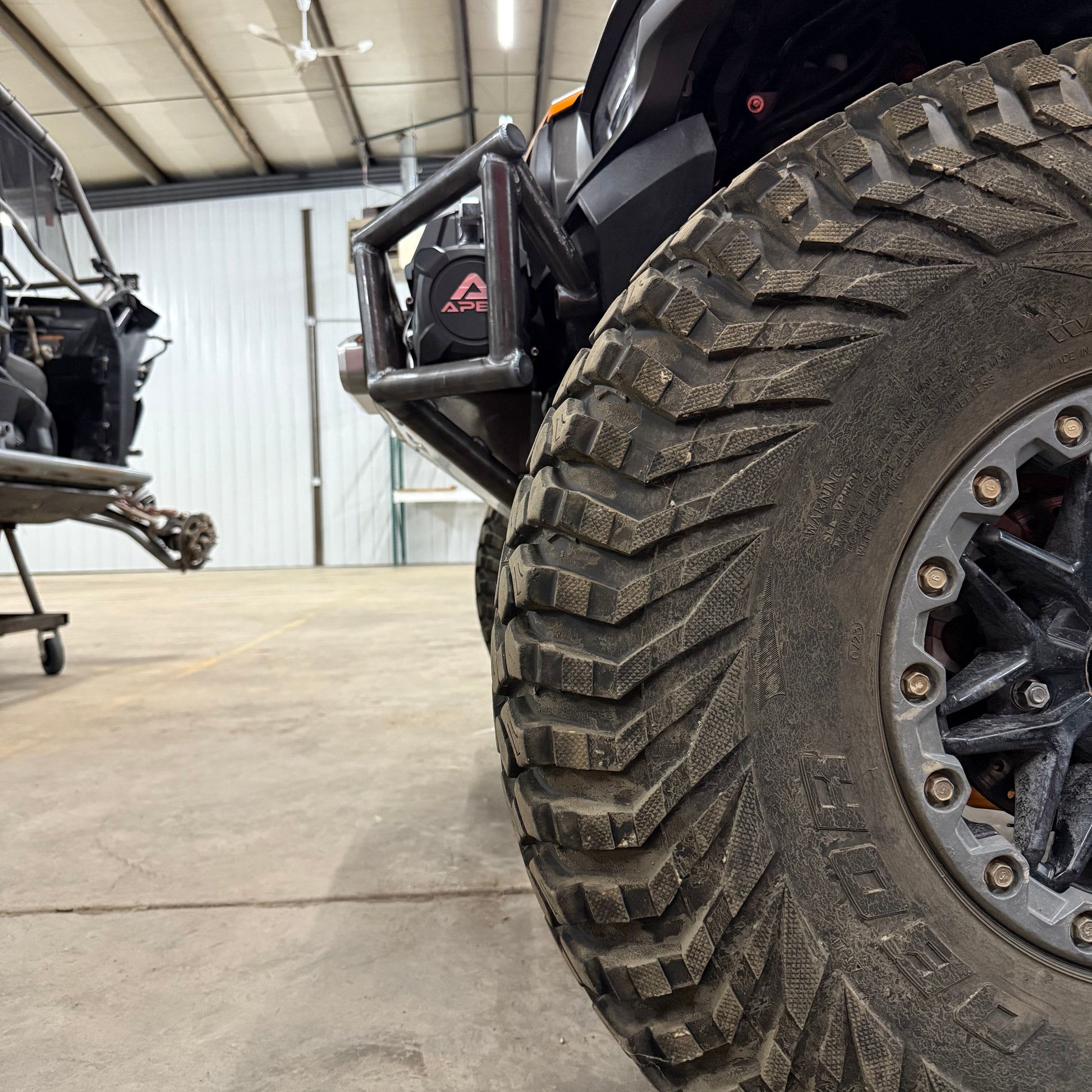 view of the KRX Titan Front Bumper mounted by Area 15 Designs for the Kawasaki KRX, showing aggressive styling and full-width protection.